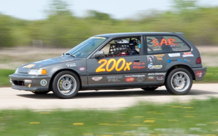 Kehler duo race their car at the Gimili Motorsports Park.