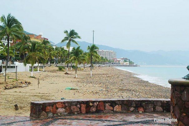 The beach was deserted as the storm steamed toward shore. Larry Kehler was hoping it would only sideswipe the pleasant resort town.